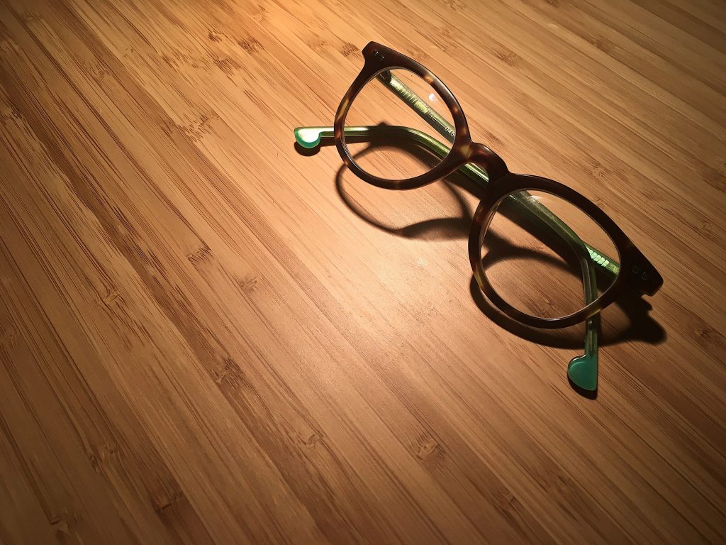 glasses on a brown table